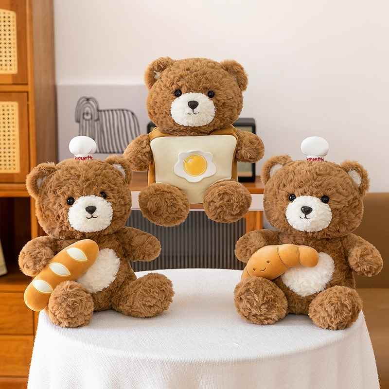 Premium bakery theme teddy bear assortment featuring baguette, croissant, and toast styles for wholesale.