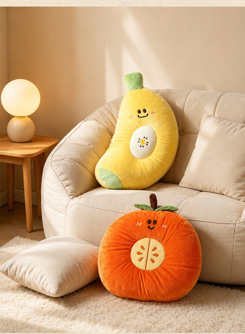 Premium banana and orange stuffed pillows displayed on a cozy beanbag chair, ideal for modern home decor supply.