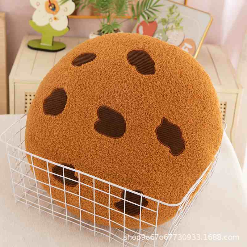 Premium boutique cookie plushie cushion in a wire basket for wholesale gift shop distributors.