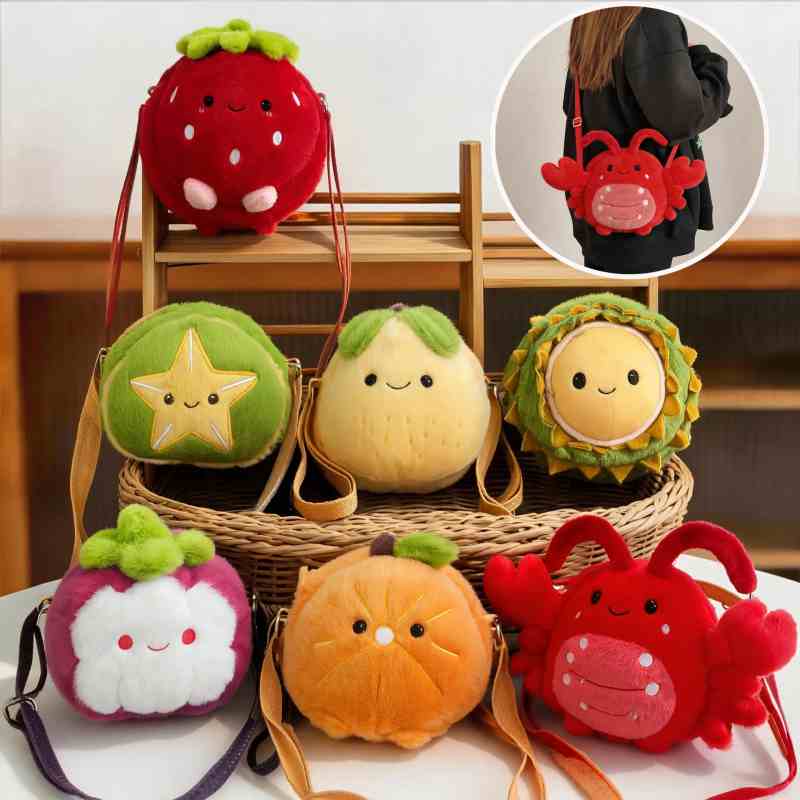 Premium boutique fruit plush bag collection display in a wicker basket with a model wearing a red crab plush crossbody purse.
