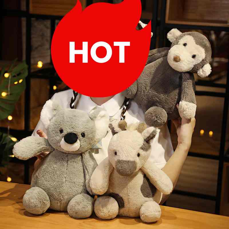 Premium boutique nursery decor plush display featuring stuffed koala, cow, and monkey soft toys for global wholesale distributors.