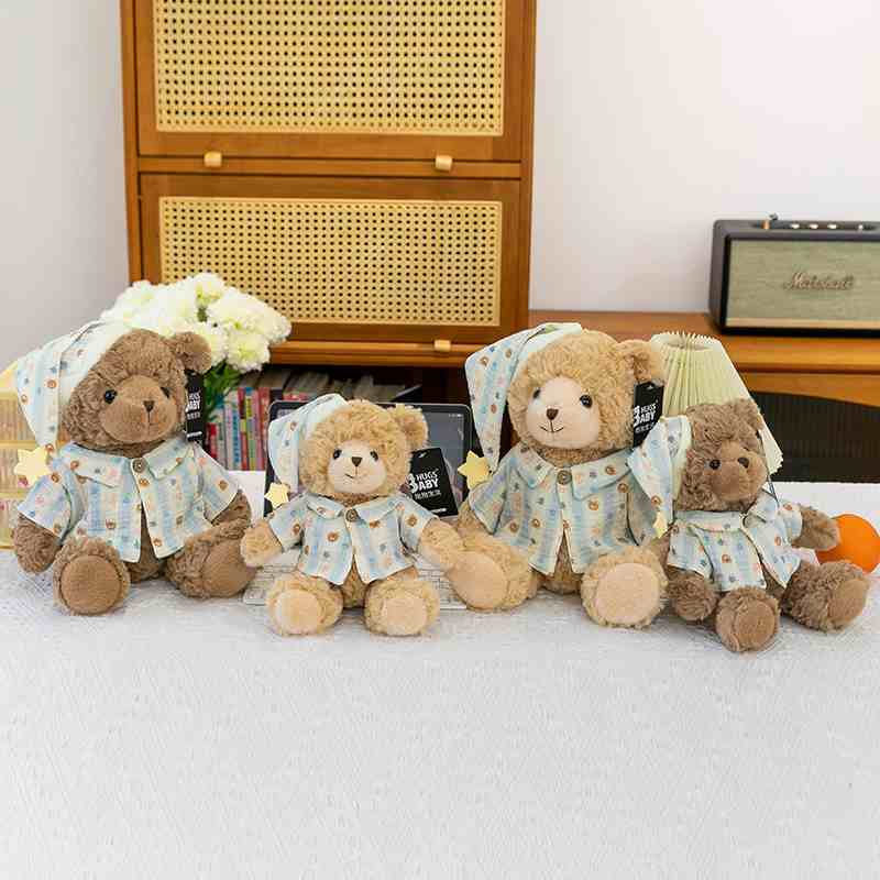 Premium boutique sleepy teddy bear collection display featuring four plush bears in pajamas for global wholesale distributors.
