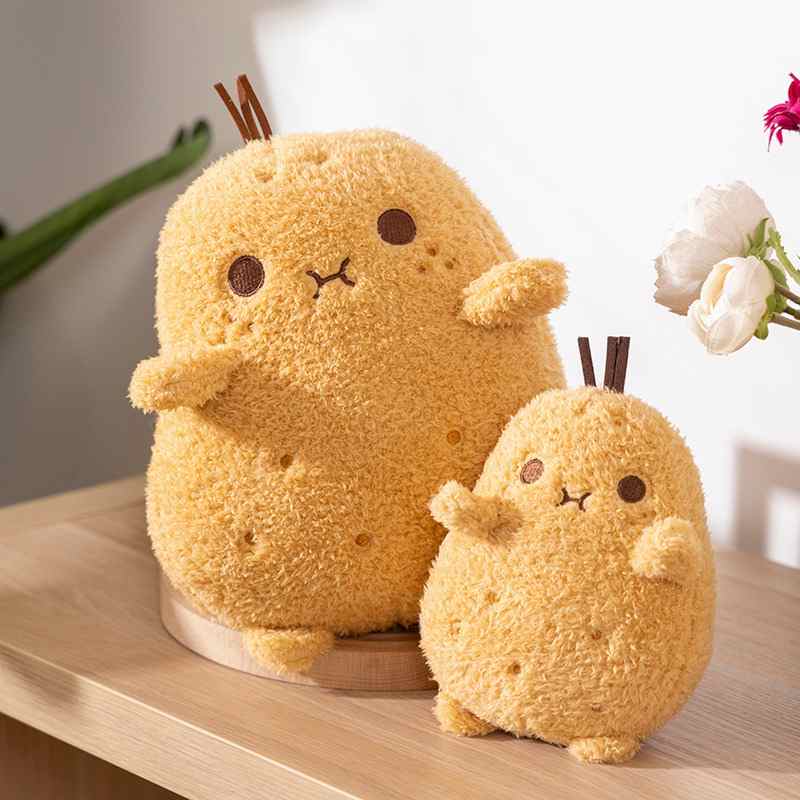 Premium cute stuffed potato pillows showcasing two sizes together on a wooden table, ideal for modern boutique supply.
