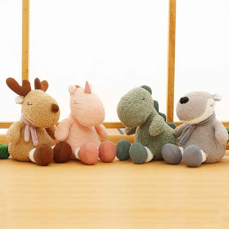 Premium fluffy stuffed animal collection featuring four pastel plush toys sitting together on a shelf for nursery decor.