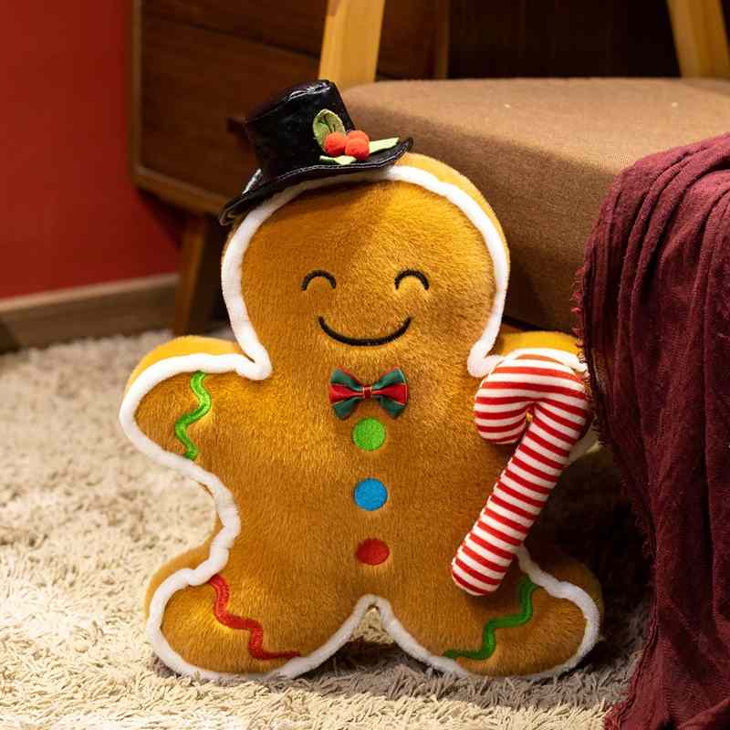 Premium gingerbread man stuffed animal with a black hat and candy cane for boutique suppliers.