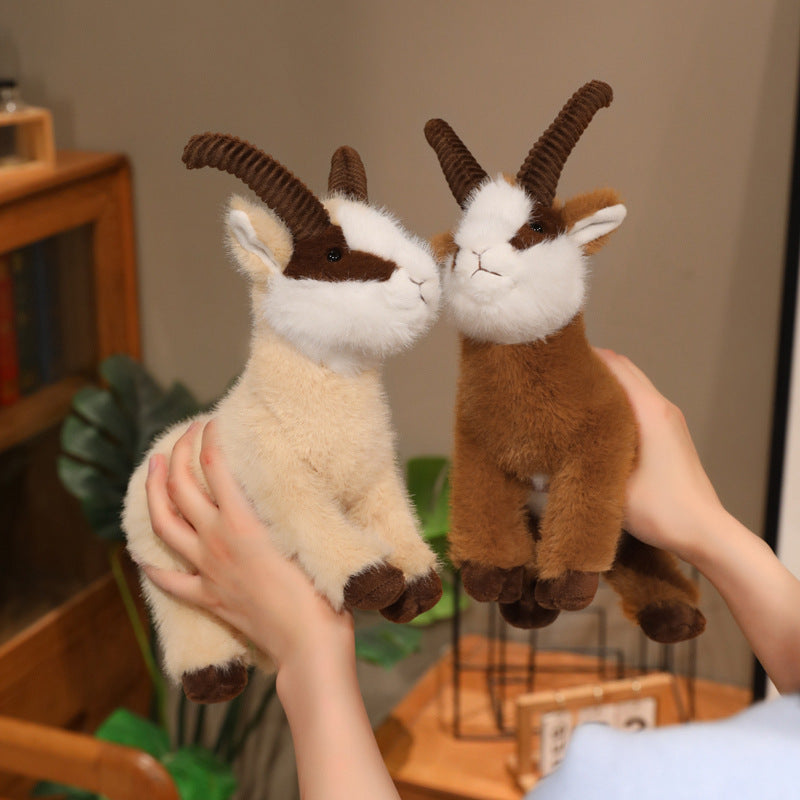 Premium lifelike ibex plush toys held up to show authentic wildlife design, excellent for national zoo souvenir supply.