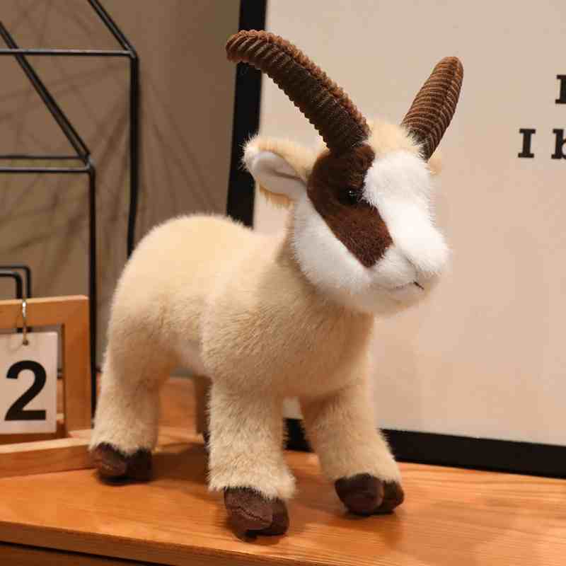 Premium light tan mountain goat stuffed animal showing lifelike texturing, ideal for premium gift shop inventory.