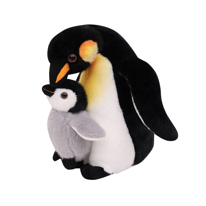 Premium realistic penguin chick plushie with parent penguin on a clean white background, ideal for high-end boutique retail supply.