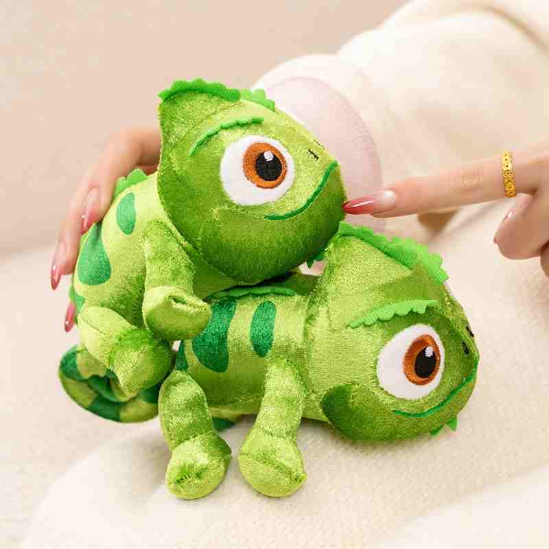 Premium stuffed lizard toy in vibrant green plush held by a model, demonstrating quality styling for novelty gift boutique supply.
