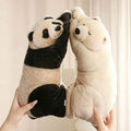 Private-label sleeping panda and polar bear plush pillows held back-to-back for B2B wholesale assortment.