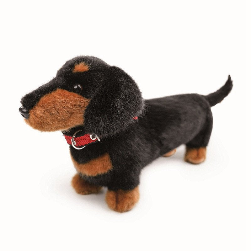 Side view of a realistic black and tan dachshund plush dog for custom manufacturing.