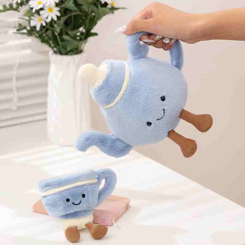 Luxury stuffed blue teapot cushion with cute corduroy legs, showcasing creative design for custom brand manufacturing.