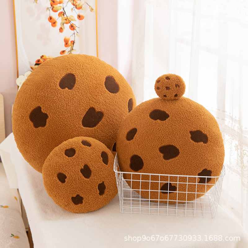 Wholesale chocolate chip cookie plush pillow assortment in multiple sizes for B2B food decor sourcing.