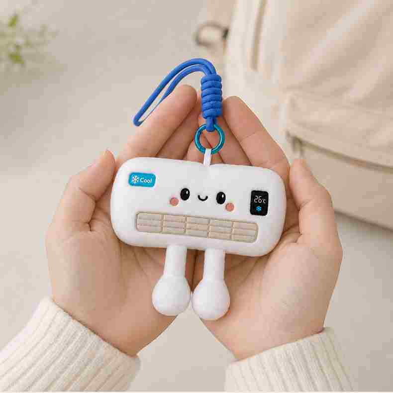 Wholesale cute air conditioner pendant held in hands, highlighting premium details for gift shop supply.