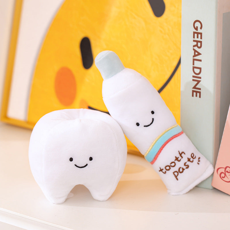Wholesale dental hygiene stuffed toys displayed with books, ready for boutique importers and educational supply.