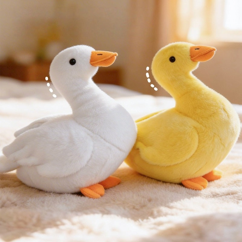 A collection of cute white and yellow chubby duck plush toys, perfect for high-margin wholesale arcade prizes.