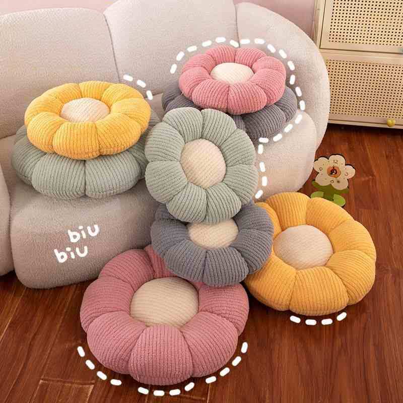 Wholesale flower shaped plush cushion assortment in multiple colors for B2B home decor sourcing.