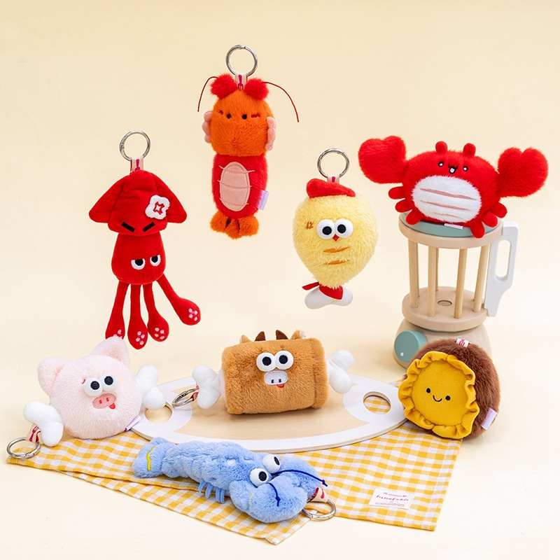 Wholesale funny plush keychain assortment featuring squid, crab, and pig for B2B boutique sourcing.