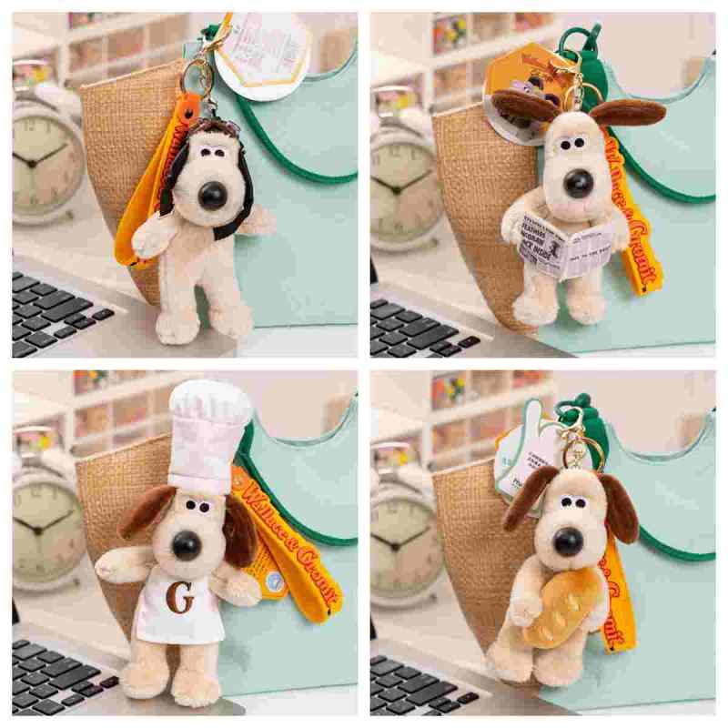 Wholesale kawaii dressed dog keychain assortment featuring chef, aviator, and newsboy plush dogs for B2B sourcing.