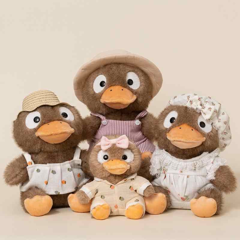 Wholesale Kawaii fluffy duck plush family set with outfits for arcade crane machine prizes.