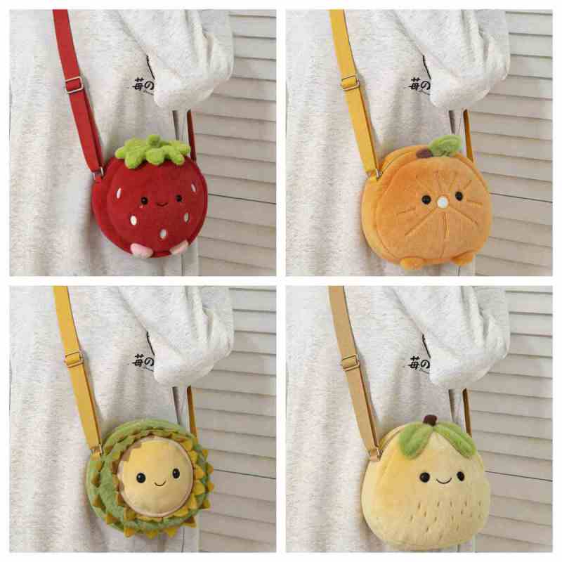 Wholesale kawaii fruit plush crossbody bag assortment featuring strawberry, orange, durian, and pear designs for B2B private label sourcing.