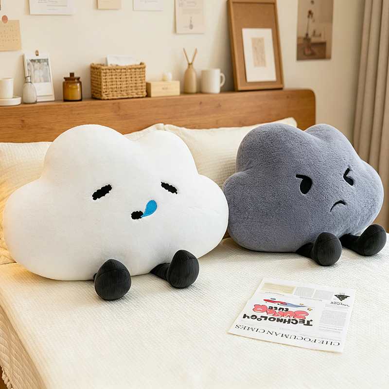 Wholesale happy white and grumpy grey cloud plush pillow assortment for B2B nursery decor sourcing.