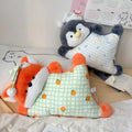 Wholesale sleeping fox and penguin plush backrest pillows on a bed for B2B home decor sourcing